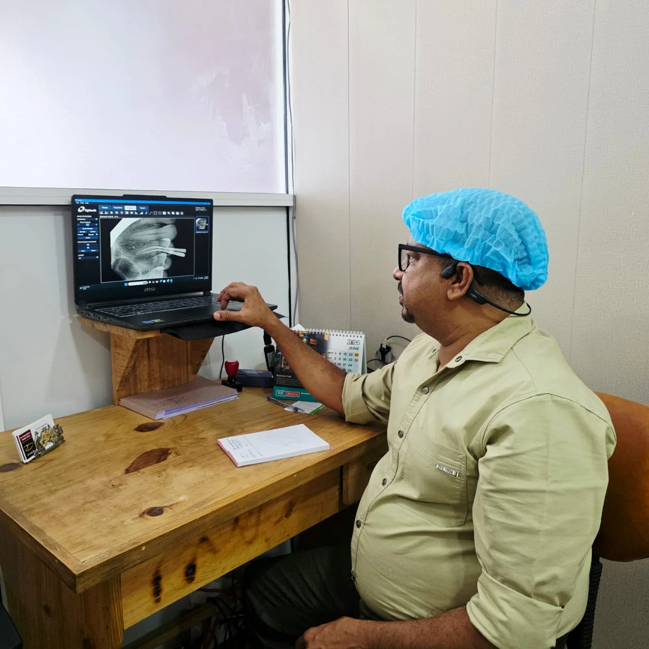 Doctor reviewing a dental radiograph