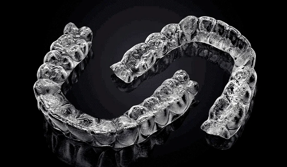 Transparent dental aligner trays ready for delivery