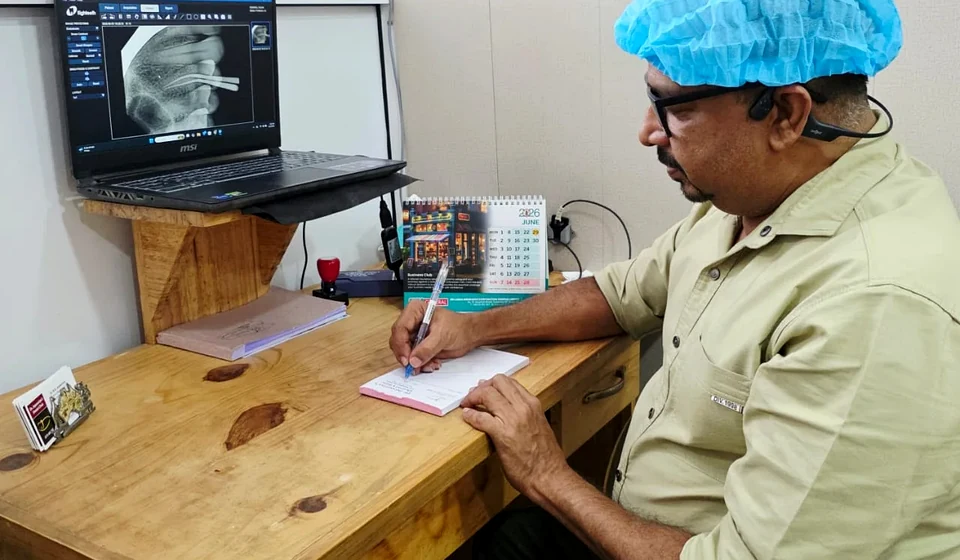 Doctor preparing notes for a clear aligner case discussion